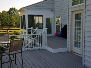 A renovated residential outdoor living deck. | Bayside Pavers