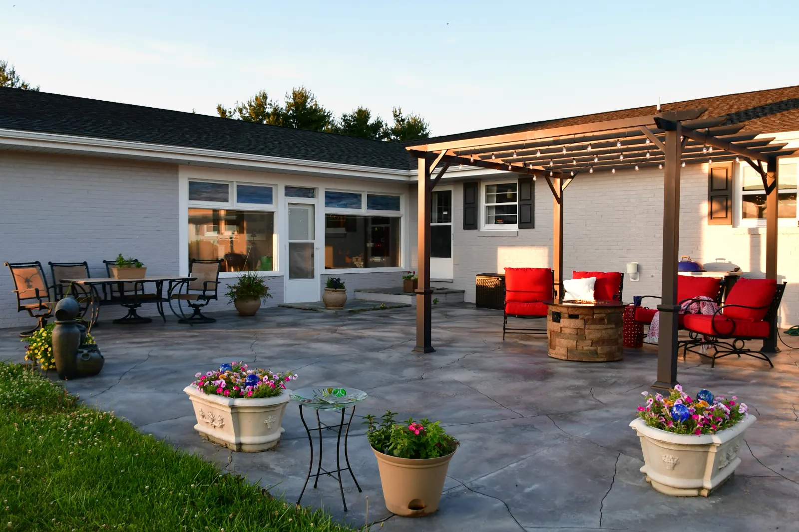 A newly built deck and pergola in a residential outdoor living space. | Bayside Pavers