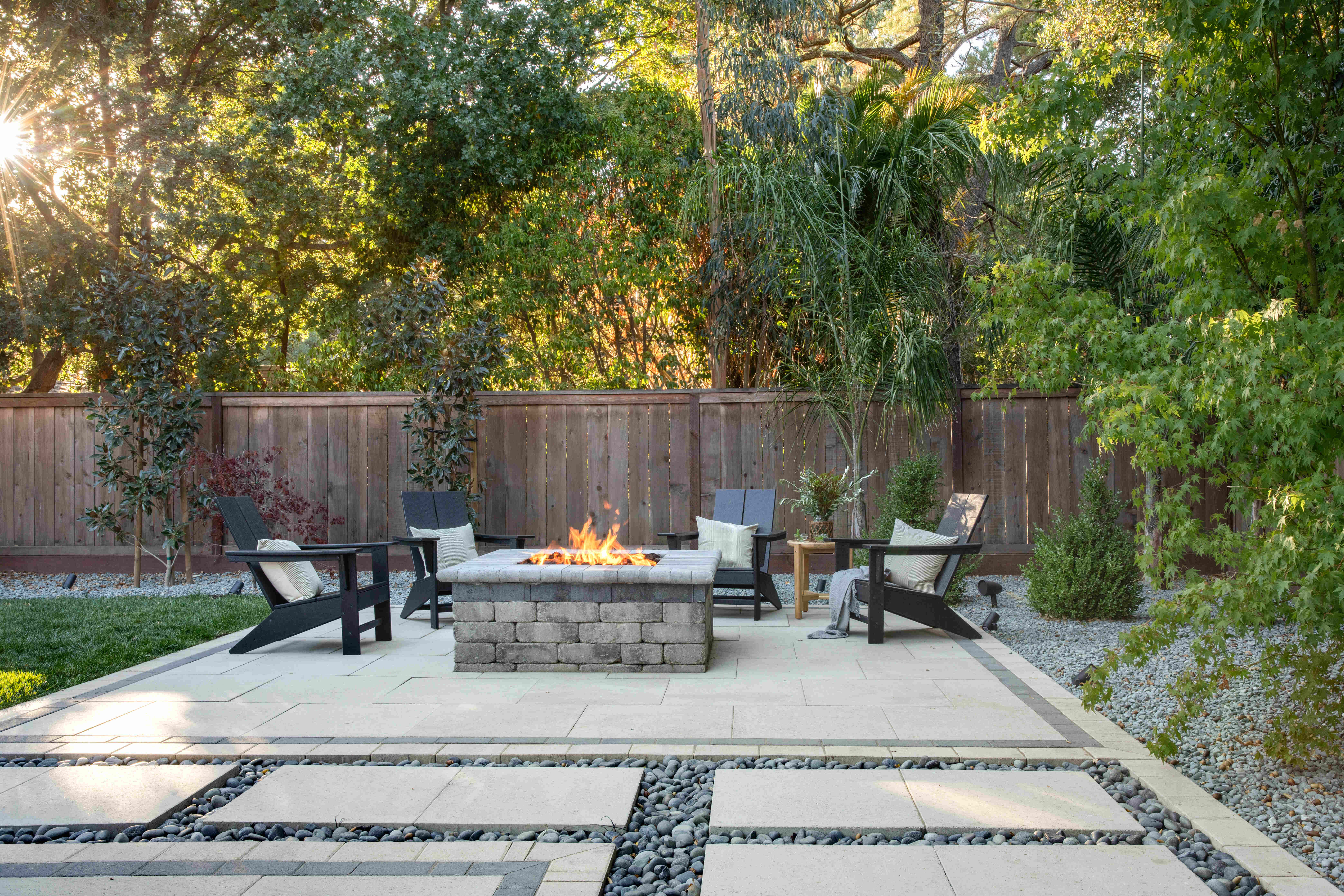 Fire pit area with stone walls in Walnut Creek